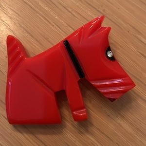 Vintage Bakelite Scotty, dog brooch in a vibrant, red color
